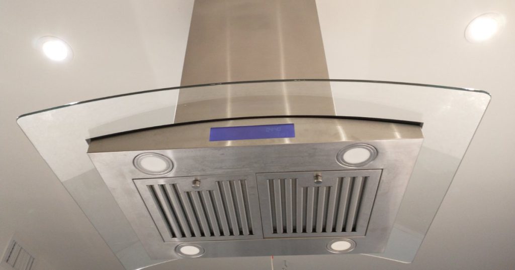 Stainless steel island range hood with two baffle grease filters, seen from below